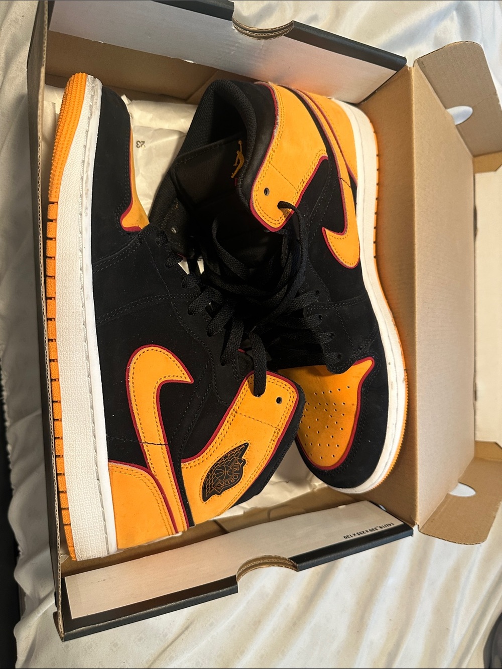 Jordan Black and Orange High-Top Sneakers